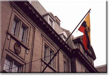 Flag and seal of Ecuador, on the Chancery facing Meridian Park.